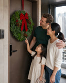 Christmas Celebration Wreath displayed at a family home entrance