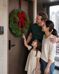 Christmas Celebration Wreath displayed at a family home entrance